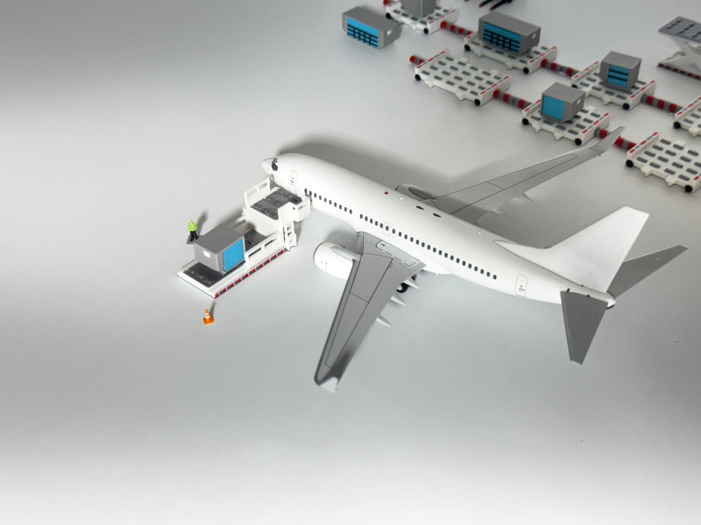 1:200 Scale White Cargo GSE For Model Airplanes. Features 26 Pieces