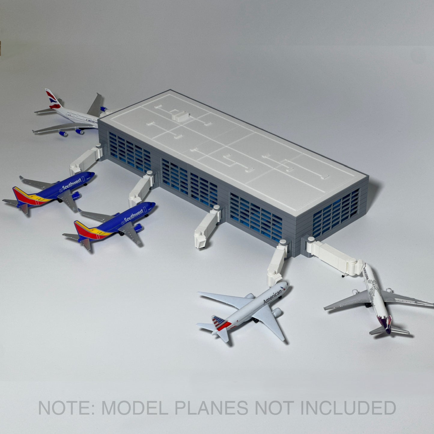 Airport Terminal Playset/Display Model– Fits Daron Planes, Moving Jetways, Removable Roof, Realistic Full Interior, Transparent Windows – Collectible Toy for Kids & Aviation Enthusiasts (18” x 7”)